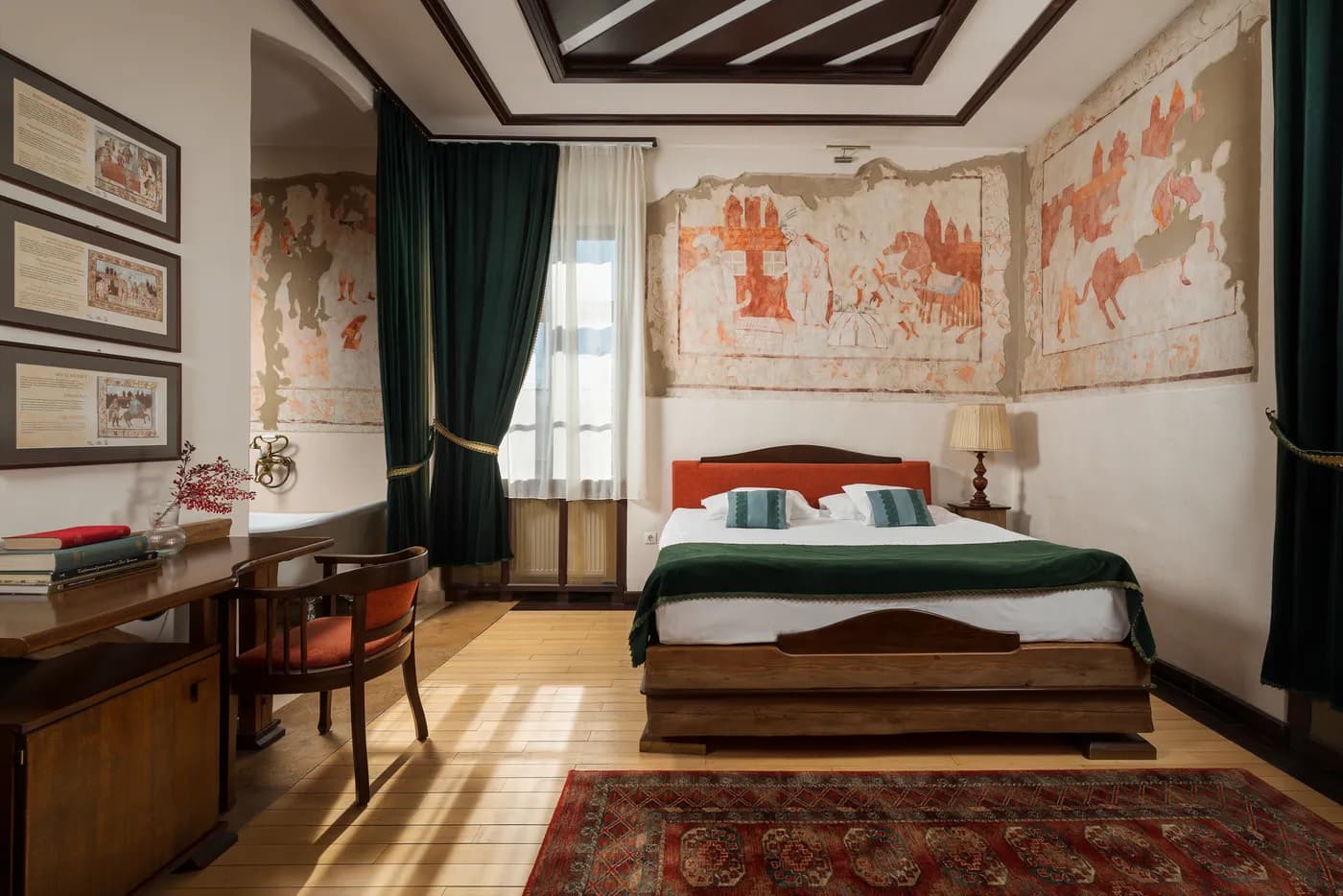 Beautifully appointed castle room with historic wall paintings