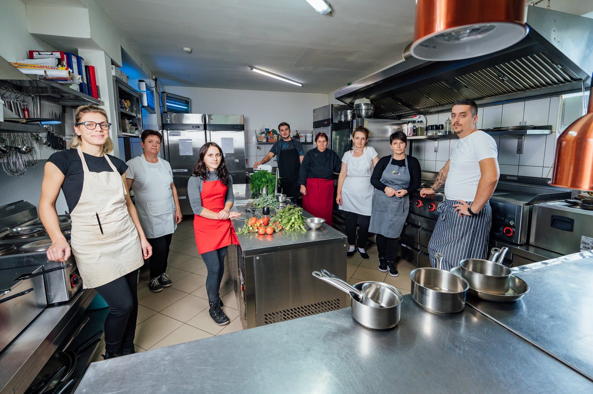 The Kitchen Team gathered in the castle's professional kitchen with fresh ingredients