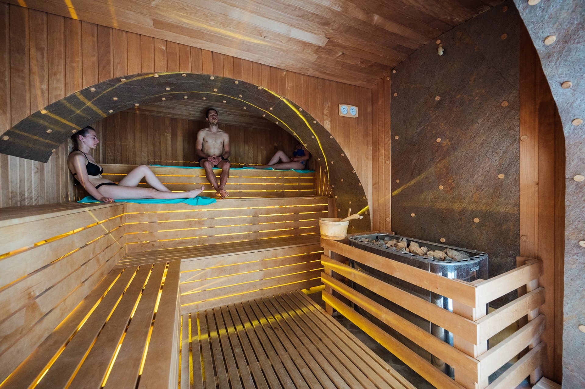 Sauna Aufguss ceremony with steam and aromatic experience